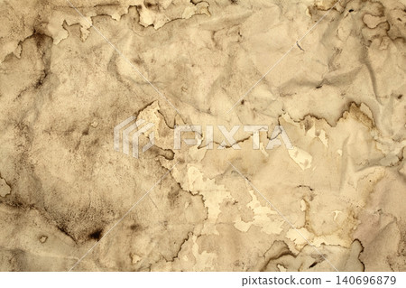 Vintage and old looking coffee cup stain background with a tea retro texture grunge paper for drawing. ancient book page. Vintage and old looking coffee cup stain background with a tea retro texture grunge paper for drawing. ancient book page. 140696879