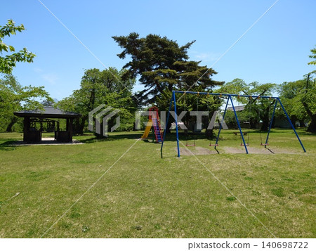 Playground equipment and rest areas in the park Playground equipment and rest areas in the park 140698722