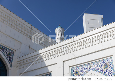 Architecture details of the Minor Mosque are under blue sky. Tashkent Architecture details of the Minor Mosque are under blue sky. Tashkent 140698799