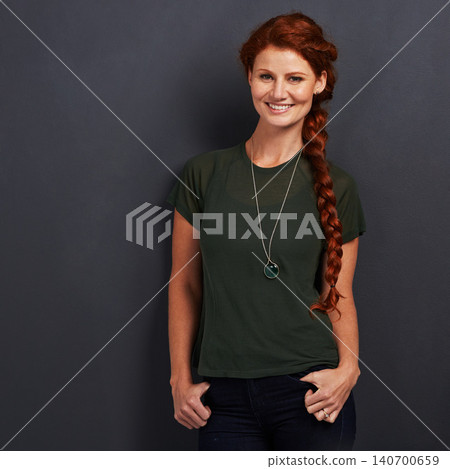 Portrait, ginger and happy woman in studio for fashion isolated on dark background mockup space. Confidence, smile and person with red hair in casual clothes, tshirt or stylish on backdrop in Ireland Portrait, ginger and happy woman in studio for fashion isolated on dark background mockup space. Confidence, smile and person with red hair in casual clothes, tshirt or stylish on backdrop in Ireland 140700659