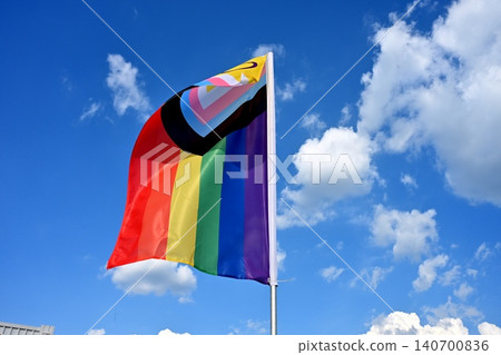 Budapest, Hungary - June 20, 2026 Progress Pride Flag Under Blue Sky Budapest, Hungary - June 20, 2026 Progress Pride Flag Under Blue Sky 140700836