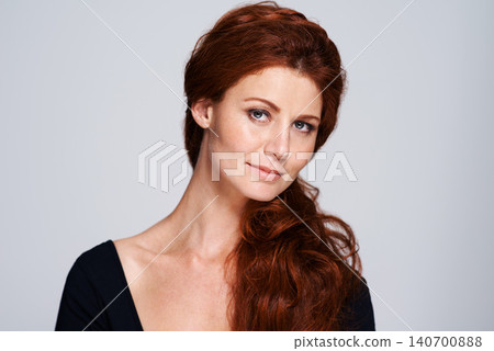 Portrait, beauty and hair with woman in studio isolated on white background for natural wellness. Face, salon and skincare confident red head model at spa for keratin or dermatology treatment Portrait, beauty and hair with woman in studio isolated on white background for natural wellness. Face, salon and skincare confident red head model at spa for keratin or dermatology treatment 140700888
