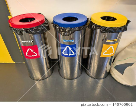 Metal recycling bins with color coded lids for waste separation Metal recycling bins with color coded lids for waste separation 140700901