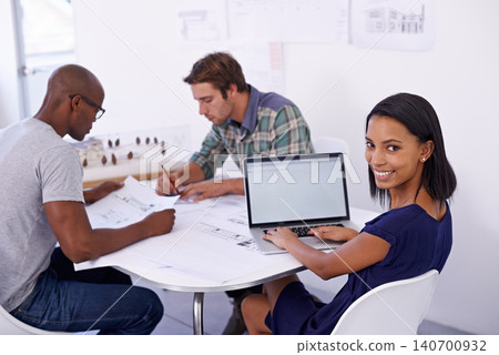 Happy woman, architect and portrait with team for meeting, planning or architectural design at office. Creative person with smile, documents or laptop screen in group project or startup at workplace Happy woman, architect and portrait with team for meeting, planning or architectural design at office. Creative person with smile, documents or laptop screen in group project or startup at workplace 140700932