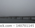 Bridge shrouded in fog 140701145