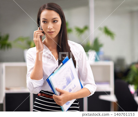 Documents, finance and phone call with business woman in corporate office for communication or networking. Accounting, planning and statistics with serious young employee talking on mobile at work 140701153