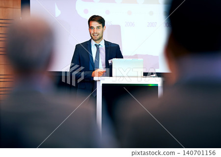 Business man, podium and presentation with projector screen, conference or workshop with laptop for slideshow. Corporate training, seminar and speaker with info, audience and professional speech 140701156