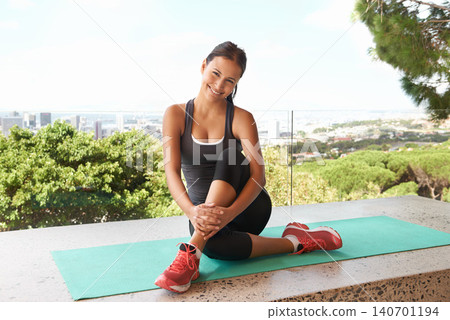 Portrait, yoga and happy woman on mat in home at balcony outdoor for exercise, wellness or body health with mockup. Smile, pilates and person on break for wellbeing, fitness or aerobics in Brazil Portrait, yoga and happy woman on mat in home at balcony outdoor for exercise, wellness or body health with mockup. Smile, pilates and person on break for wellbeing, fitness or aerobics in Brazil 140701194
