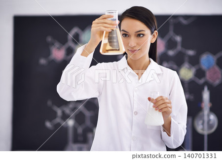 Woman, laboratory and science experiment with beakers for medical investigation as research, solution or futuristic. Female person, equipment and liquid for dna testing, breakthrough or chemistry Woman, laboratory and science experiment with beakers for medical investigation as research, solution or futuristic. Female person, equipment and liquid for dna testing, breakthrough or chemistry 140701331