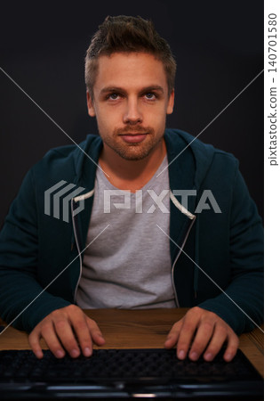 Man, keyboard for coding and programmer typing, information technology with video game or software development. Internet, computer programming and face with gamer or developer for cyber security 140701580