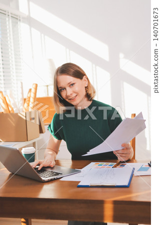 Fashion designer woman and typing on laptop in shop for email project or online order of fabric in creative startup Serious tailor computer and small business for clothes or textile in : Generative AI 140701673