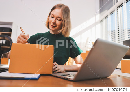 Fashion designer woman and typing on laptop in shop for email project or online order of fabric in creative startup Serious tailor computer and small business for clothes or textile in : Generative AI 140701674