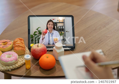Telehealth nutrition consultation online for wellness remote healthcare with doctor on tablet patient 140701997