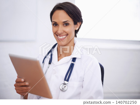 Portrait, doctor and happy woman with tablet in hospital for healthcare, wellness or telehealth online. Face, smile and medical professional with technology, employee or expert physician in Brazil Portrait, doctor and happy woman with tablet in hospital for healthcare, wellness or telehealth online. Face, smile and medical professional with technology, employee or expert physician in Brazil 140702250