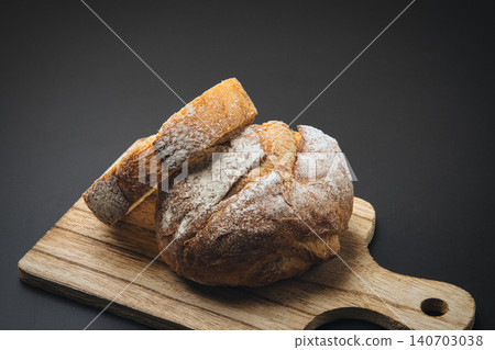 A hard-crusted bread perfect for a leisurely weekend breakfast. 140703038