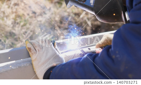 Fabricator Creating Weld Seam On Steel Beam With Controlled Torch And Steady Gloves, Visible Bead Formation And Bright Arc, Focused Fabrication Scene Emphasizing Craftsmanship And Technique Fabricator Creating Weld Seam On Steel Beam With Controlled Torch And Steady Gloves, Visible Bead Formation And Bright Arc, Focused Fabrication Scene Emphasizing Craftsmanship And Technique 140703271