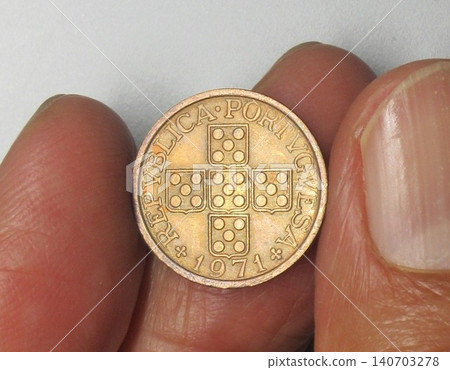 A 20-centavos bronze coin issued in Portugal in 1971. A 20-centavos bronze coin issued in Portugal in 1971. 140703278