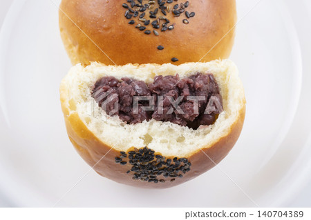 Sweet bean paste bun with black sesame seeds Sweet bean paste bun with black sesame seeds 140704389