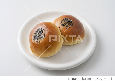 Sweet bean paste bun with black sesame seeds Sweet bean paste bun with black sesame seeds 140704401