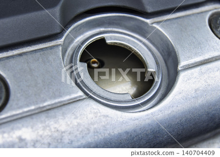Hole for motor oil fill on top of the engine Hole for motor oil fill on top of the engine 140704409