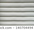 Close up texture of modern zebra roller blinds with alternating sheer and opaque fabric stripes. Minimalist window covering background for interior design concepts 140704494