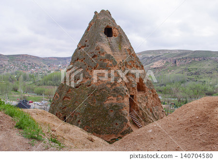 Ancient Cave Dwelling in Cappadocia, Turkey Ancient Cave Dwelling in Cappadocia, Turkey 140704580