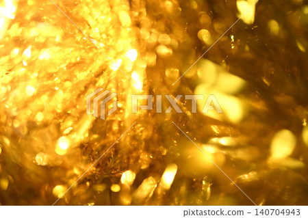 A background material featuring glittering golden decorations. A background material featuring glittering golden decorations. 140704943