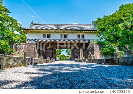[#Shibata] A view of the Shibata Castle main gate against a blue sky. 140705300
