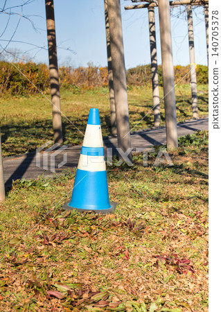 Triangular cone for construction work urging caution and regulation Triangular cone for construction work urging caution and regulation 140705378