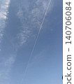 A crow that stops on the electric wire 140706084