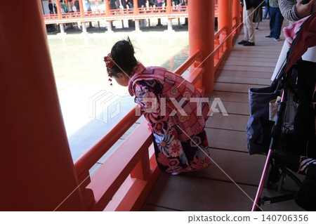 Children visiting Itsukushima Shrine in kimonos Children visiting Itsukushima Shrine in kimonos 140706356