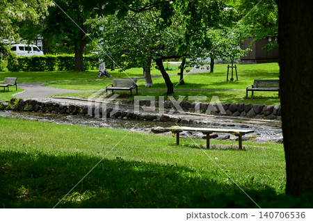 The scene of Nakajima Park in Sapporo, Hokkaido, Japan. The scenery of Nakajima Park in summer. A japanese garden and a decent public park in Japan. Nature and Travel scene. The scene of Nakajima Park in Sapporo, Hokkaido, Japan. The scenery of Nakajima Park in summer. A japanese garden and a decent public park in Japan. Nature and Travel scene. 140706536