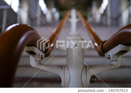 Close-up of the concrete stairs. Long stair railings in the station of Sapporo, Hokkaido, Japan. Cityscape and travel concept. Close-up of the concrete stairs. Long stair railings in the station of Sapporo, Hokkaido, Japan. Cityscape and travel concept. 140707013