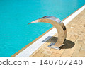 The outdoor pool with the Cobra jet waterfall is made of stainless steel. 140707240