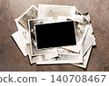 Lots of old vintage photos. Copy space. Brown background. 140708467