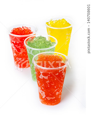 Colorful Frozen Slush Drinks in Plastic Cups Colorful Frozen Slush Drinks in Plastic Cups 140708601