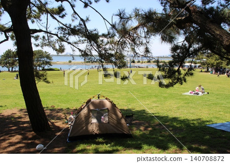 Camping at Kasai Rinkai Park in the summer. Camping at Kasai Rinkai Park in the summer. 140708872
