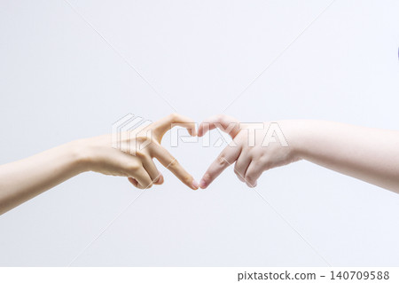 Making a heart shape with your hands; heart symbol; finger heart; heart hand; finger heart; hand sign; image material. Making a heart shape with your hands; heart symbol; finger heart; heart hand; finger heart; hand sign; image material. 140709588