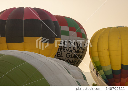 Hot air balloons getting ready for festival internacional del globo Hot air balloons getting ready for festival internacional del globo 140709811