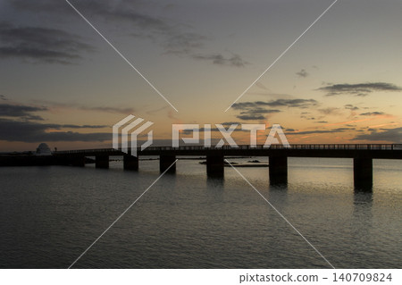 Arrecife bridge connecting island at sunset 140709824