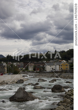Odda town river rapids flowing through norway landscape Odda town river rapids flowing through norway landscape 140709839