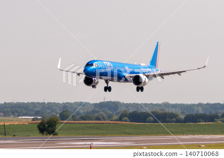 ITA Airways Airbus A320neo airplane landing on runway ITA Airways Airbus A320neo airplane landing on runway 140710068