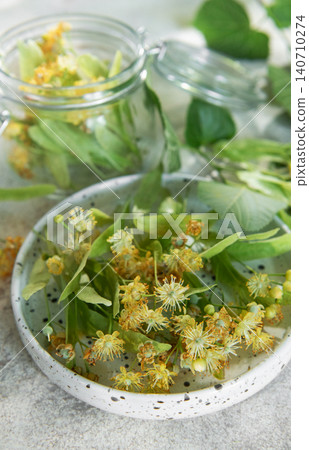 Linden flowers preparing for herbal tea infusion 140710274