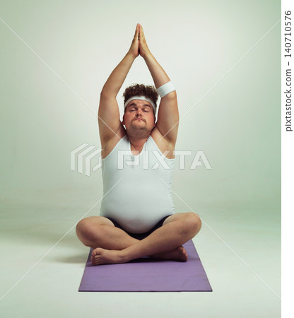 Man, plus size and meditation with mat in studio on white background with exercise or stretching for fitness. Healthy, wellness and progress with body positivity for mindset, zen and hands up Man, plus size and meditation with mat in studio on white background with exercise or stretching for fitness. Healthy, wellness and progress with body positivity for mindset, zen and hands up 140710576