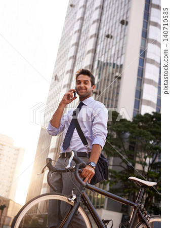 Bicycle, phone call and portrait of business man for travel, morning commute and cycling in city. Professional, communication and person with bike for sustainable transport on smartphone for talking Bicycle, phone call and portrait of business man for travel, morning commute and cycling in city. Professional, communication and person with bike for sustainable transport on smartphone for talking 140710585