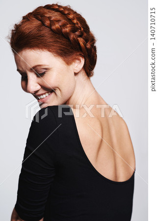 Smile, beauty and haircare with plait for woman person, studio and isolated on white background. Ginger, braid and redhead female model, over shoulder or cosmetic treatment for healthy hair aesthetic Smile, beauty and haircare with plait for woman person, studio and isolated on white background. Ginger, braid and redhead female model, over shoulder or cosmetic treatment for healthy hair aesthetic 140710715