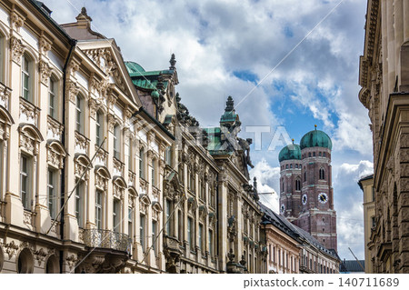 Famous Munich Cathedral, also called Cathedral of Our Dear Lady in Munich, Germany. Seen from Kardinal-Faulhaber street Famous Munich Cathedral, also called Cathedral of Our Dear Lady in Munich, Germany. Seen from Kardinal-Faulhaber street 140711689