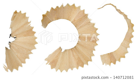 Wood shavings from a white pencil on an isolated background Wood shavings from a white pencil on an isolated background 140712081