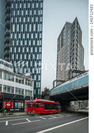 Modern Urban Architecture and City Streets with Contemporary Buildings Trees Modern Urban Architecture and City Streets with Contemporary Buildings Trees 140712483