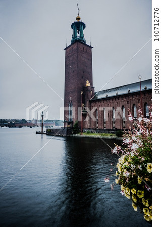 Stockholm City Hall Stadshuset in Stockholm Sweden with Tower and Waterfront During Rain Under Stockholm City Hall Stadshuset in Stockholm Sweden with Tower and Waterfront During Rain Under 140712776